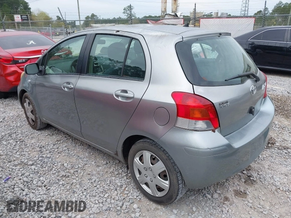 2010 Toyota Yaris z VIN JTDKT4K38A5296999, wystawiony jako IAAI lot #41878127 z przebiegiem 122 692 mil mil oraz . Historia ofert i sprzedaży dostępna na DreamBid. Obrazek 3.