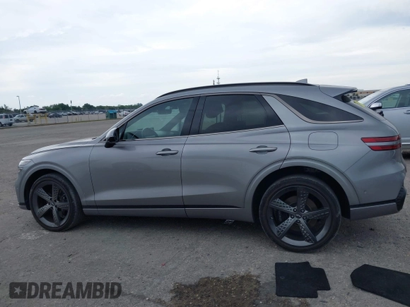 2023 Genesis GV70 Sport with VIN KMUMCDTC1PU098851, listed as a IAAI auction lot 41864774 with 15,016 mi miles and . Bid and sale history available at DreamBid. Image 14.