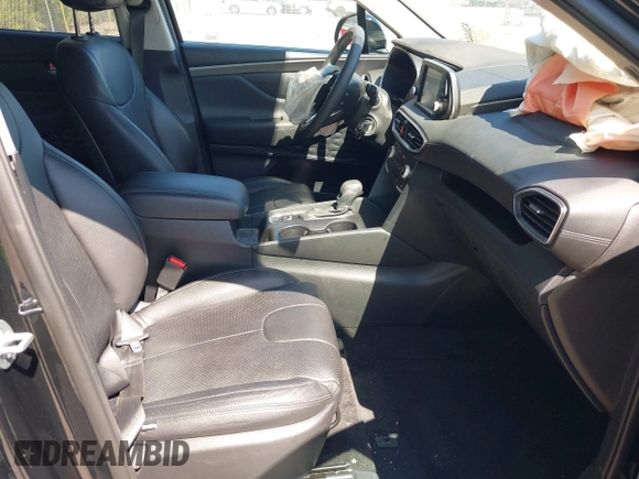 2019 Hyundai Santa Fe SE with VIN 5NMS23AD4KH088902, listed as a IAAI auction lot 42044465 with 34,302 mi miles and . Bid and sale history available at DreamBid. Image 5.