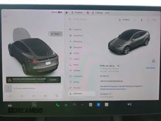 2021 Tesla Model Y Long Range with VIN 5YJYGAEE2MF260142, listed as a IAAI auction lot 41808666 with 87,316 mi miles and . Bid and sale history available at DreamBid. Image 7.