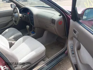 1996 Toyota Camry DX with VIN 4T1BG12K1TU785209, listed as a IAAI auction lot 41802026 with 223,452 mi miles. Bid and sale history available at carsss.com. Image 5.