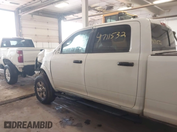 2015 Ram 2500 SLT z VIN 3C6TR5JT2FG645527, wystawiony jako IAAI lot #41711532 z przebiegiem 178 185 mil mil oraz . Historia ofert i sprzedaży dostępna na DreamBid. Obrazek 13.