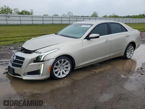 2014 Cadillac CTS Luxury RWD with VIN 1G6AR5S35E0170749, listed as a Copart auction lot 50735645 with 105,638 mi miles and Salvage Title. Bid and sale history available at DreamBid. Image 1.