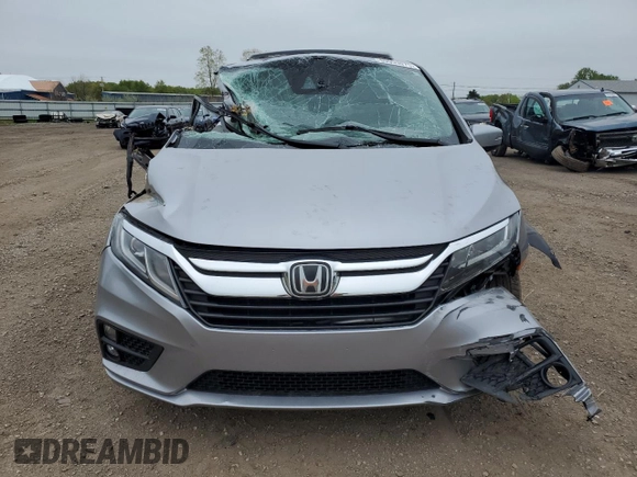 2019 Honda Odyssey EX-L z VIN 5FNRL6H7XKB049729, wystawiony jako Copart lot #55953075 z przebiegiem 129 194 mil mil oraz Szkoda całkowita • Salvage title. Historia ofert i sprzedaży dostępna na DreamBid. Obrazek 5.