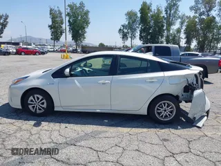 2016 Toyota Prius Four with VIN JTDKARFUXG3511034, listed as a IAAI auction lot 42137394 with 77,424 mi miles. Bid and sale history available at carsss.com. Image 14.