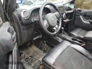 2012 Jeep Wrangler Unlimited Rubicon with VIN 1C4HJWFG7CL205244, listed as a Copart auction lot 86651914 with Not provided miles and Salvage title. Bid and sale history available at DreamBid. Image 8.