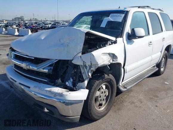 2002 Chevrolet Tahoe LS z VIN 1GNEC13TX2R240719, wystawiony jako IAAI lot #41616356 z przebiegiem 235 081 mil mil oraz . Historia ofert i sprzedaży dostępna na DreamBid. Obrazek 6.