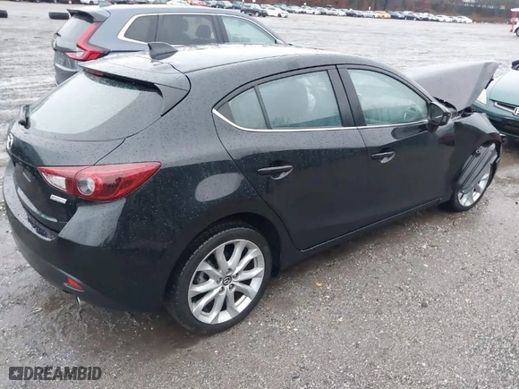 2014 Mazda Mazda3 s Grand Touring with VIN JM1BM1M31E1182946, listed as a IAAI auction lot 41056179 with NaN miles. Bid and sale history available at carsss.com. Image 4.