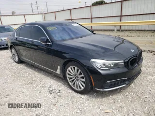 2016 BMW 7 Series 740i with VIN WBA7E2C57GG714631, listed as a Copart auction lot 67532853 with 83,230 mi miles. Bid and sale history available at carsss.com. Image 4.