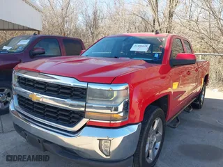 2016 Chevrolet Silverado 1500 LT with VIN 1GCRCREC2GZ256250, listed as a IAAI auction lot 41403628 with 121,497 mi miles. Bid and sale history available at carsss.com. Image 2.