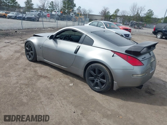 2004 Nissan 350Z Touring with VIN JN1AZ34DX4M100407, listed as a IAAI auction lot 41758380 with 154,166 mi miles. Bid and sale history available at carsss.com. Image 3.