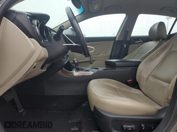 2013 Kia Optima EX z VIN 5XXGN4A70DG207530, wystawiony jako Copart lot #58270795 z przebiegiem 188 998 mil mil oraz Szkoda całkowita • Salvage title. Historia ofert i sprzedaży dostępna na DreamBid. Obrazek 7.