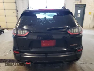 2019 Jeep Cherokee Trailhawk z VIN 1C4PJMBX2KD317917, wystawiony jako Copart lot #61079955 z przebiegiem 94 169 mil mil oraz Czysty tytuł • Clean title. Historia ofert i sprzedaży dostępna na DreamBid. Obrazek 6.