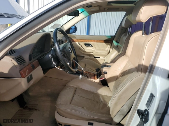2000 BMW 7 Series 740iA with VIN WBAGG8341YDN78262, listed as a Copart auction lot 77690714 with 217,607 mi miles and Salvage Title. Bid and sale history available at carsss.com. Image 7.