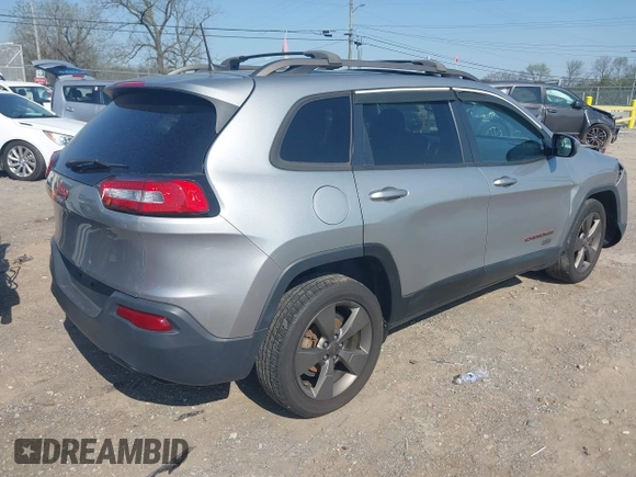 2016 Jeep Cherokee 75th Anniversary with VIN 1C4PJLCB5GW287420, listed as a IAAI auction lot 41984043 with 145,577 mi miles. Bid and sale history available at carsss.com. Image 4.