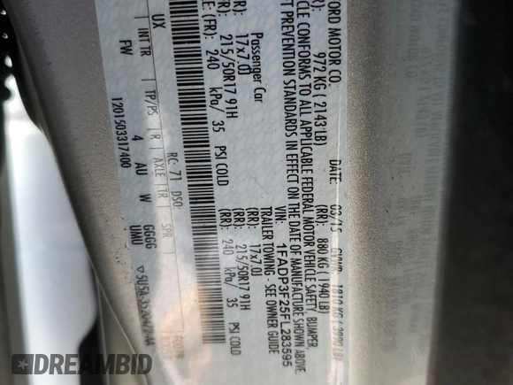 2015 Ford Focus SE z VIN 1FADP3F25FL283595, wystawiony jako Copart lot #57966705 z przebiegiem 182 405 mil mil oraz Szkoda całkowita • Salvage title. Historia ofert i sprzedaży dostępna na DreamBid. Obrazek 13.