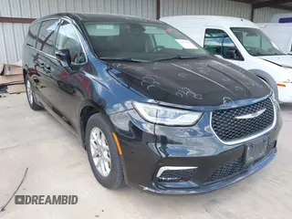 2023 Chrysler Pacifica Touring L with VIN 2C4RC1BG1PR550628, listed as a IAAI auction lot 42553430 with 61,773 mi miles and . Bid and sale history available at DreamBid. Image 1.