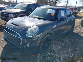 2015 MINI Cooper Hardtop 4 Door S with VIN WMWXU3C52F2B56517, listed as a IAAI auction lot 41437491 with 111,916 mi miles. Bid and sale history available at carsss.com. Image 17.