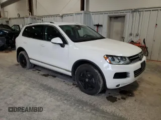 2012 Volkswagen Touareg Sport with VIN WVGFK9BP3CD002756, listed as a Copart auction lot 53378665 with 149,918 mi miles and Clean title. Bid and sale history available at DreamBid. Image 4.