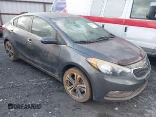 2014 Kia Forte EX with VIN KNAFX4A87E5074783, listed as a IAAI auction lot 41512090 with 626,820 mi miles. Bid and sale history available at carsss.com. Image 1.