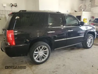 2011 Cadillac Escalade Platinum Edition z VIN 1GYS4DEF6BR193040, wystawiony jako Copart lot #56910155 z przebiegiem 132 754 mil mil oraz Szkoda całkowita • Salvage title. Historia ofert i sprzedaży dostępna na DreamBid. Obrazek 3.