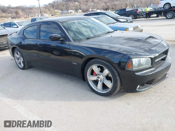 2006 Dodge Charger SRT-8 with VIN 2B3LA73W96H371246, listed as a IAAI auction lot 41676168 with 130,064 mi miles and . Bid and sale history available at carsss.com. Image 1.