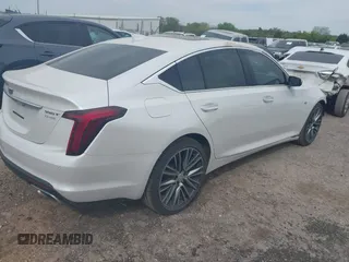2024 Cadillac CT5 Premium Luxury z VIN 1G6DT5RW3R0129279, wystawiony jako IAAI lot #42011369 z przebiegiem 5 477 mil mil oraz . Historia ofert i sprzedaży dostępna na DreamBid. Obrazek 4.