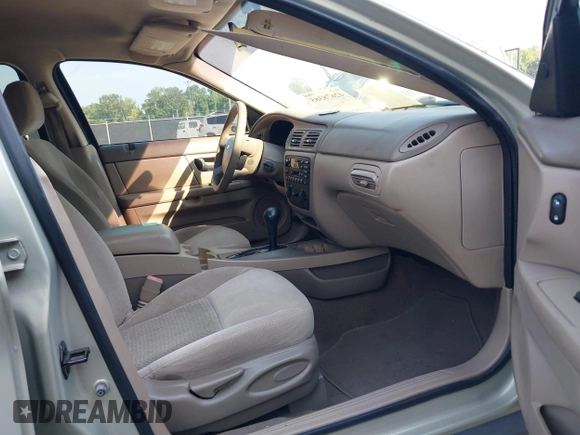 2005 Ford Taurus SE with VIN 1FAFP53205A131307, listed as a IAAI auction lot 42678385 with 198,491 mi miles and . Bid and sale history available at DreamBid. Image 5.