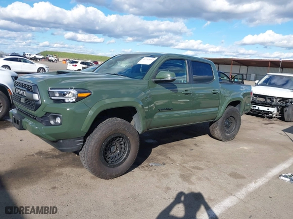 2021 Toyota Tacoma 4WD SR with VIN 3TMCZ5AN4MM401998, listed as a IAAI auction lot 41712813 with 91,371 mi miles. Bid and sale history available at carsss.com. Image 4.