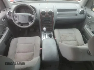 2007 Ford Freestyle SEL z VIN 1FMDK05137GA27655, wystawiony jako Copart lot #57710215 z przebiegiem 131 176 mil mil oraz Czysty tytuł • Clean title. Historia ofert i sprzedaży dostępna na DreamBid. Obrazek 8.