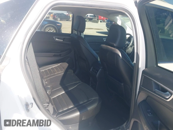 2022 Ford Edge SEL z VIN 2FMPK4J90NBA02961, wystawiony jako IAAI lot #41446422 z przebiegiem 29 313 mil mil oraz . Historia ofert i sprzedaży dostępna na DreamBid. Obrazek 8.