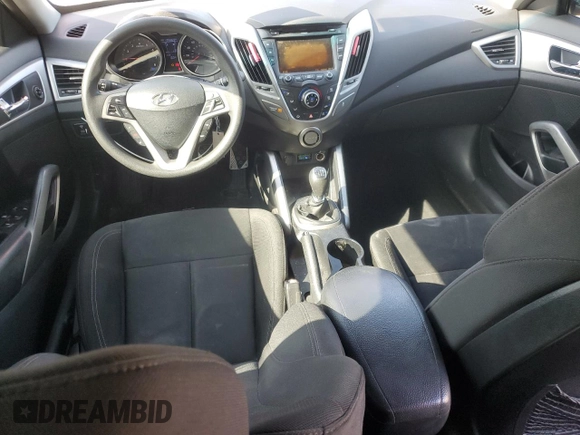 2013 Hyundai Veloster w/Gray Int z VIN KMHTC6AD1DU103219, wystawiony jako Copart lot #60426875 z przebiegiem 135 869 mil mil oraz Szkoda całkowita • Salvage title. Historia ofert i sprzedaży dostępna na DreamBid. Obrazek 8.