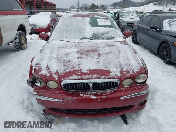 2003 Jaguar X-Type 2.5L Manual z VIN SAJEA51D63XC89273, wystawiony jako IAAI lot #41298544 z przebiegiem 124 400 mil mil oraz . Historia ofert i sprzedaży dostępna na DreamBid. Obrazek 12.