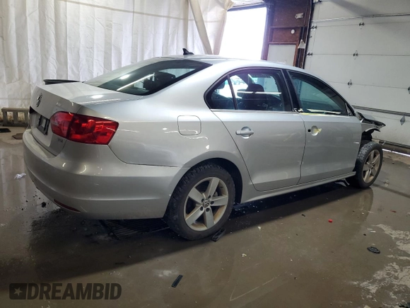 2014 Volkswagen Jetta TDI w/Premium with VIN 3VW3L7AJ3EM310892, listed as a Copart auction lot 61235765 with 242,970 mi miles and Salvage title. Bid and sale history available at DreamBid. Image 3.