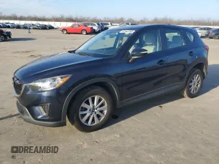2015 Mazda CX-5 Sport z VIN JM3KE2BE6F0491107, wystawiony jako Copart lot #42462395 z przebiegiem 82 528 mil mil oraz Szkody całkowita. Historia ofert i sprzedaży dostępna na DreamBid. Obrazek 1.