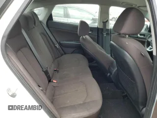 2019 Kia Optima LX z VIN 5XXGT4L38KG308568, wystawiony jako Copart lot #57218295 z przebiegiem 71 963 mil mil oraz Szkoda całkowita • Salvage title. Historia ofert i sprzedaży dostępna na DreamBid. Obrazek 10.
