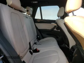 2018 BMW X1 xDrive28i with VIN WBXHT3C30J5K23793, listed as a Copart auction lot 42944555 with 72,250 mi miles and Salvage Title. Bid and sale history available at carsss.com. Image 11.