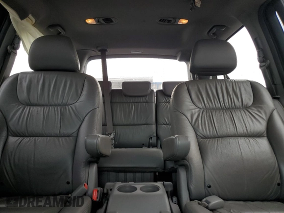 2010 Honda Odyssey EX-L z VIN 5FNRL3H76AB071109, wystawiony jako Copart lot #70342294 z przebiegiem 187 872 mil mil oraz Szkoda całkowita • Salvage title. Historia ofert i sprzedaży dostępna na DreamBid. Obrazek 10.