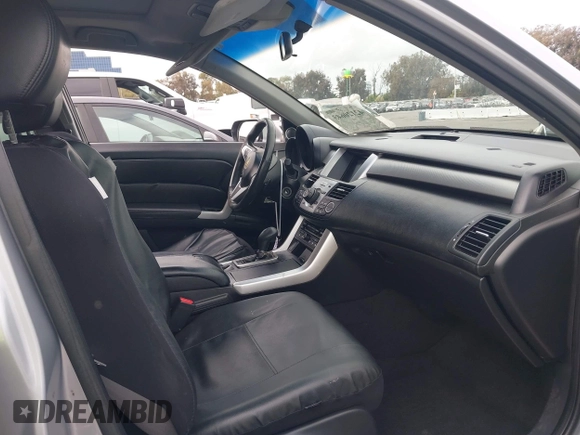 2007 Acura RDX Technology z VIN 5J8TB18527A010225, wystawiony jako IAAI lot #42120643 z przebiegiem 166 278 mil mil oraz . Historia ofert i sprzedaży dostępna na DreamBid. Obrazek 5.