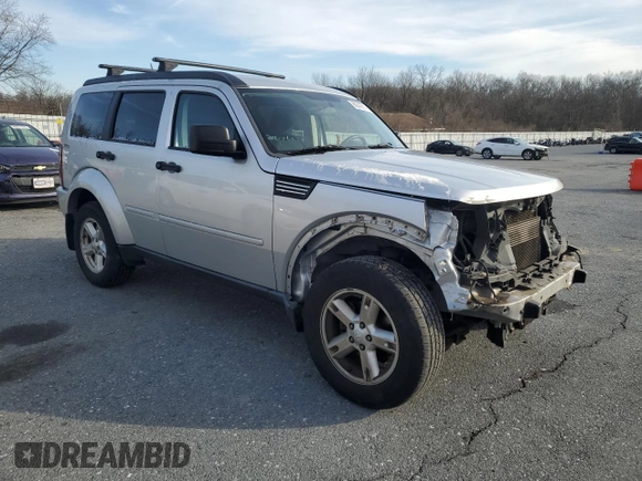 2009 Dodge Nitro SXT with VIN 1D8GU28K19W545432, listed as a Copart auction lot 86243914 with 144,577 mi miles and Salvage Title. Bid and sale history available at DreamBid. Image 4.