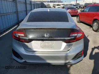 2020 Honda Clarity Touring z VIN JHMZC5F3XLC001848, wystawiony jako Copart lot #56748915 z przebiegiem 89 652 mil mil oraz Szkoda całkowita • Salvage title. Historia ofert i sprzedaży dostępna na DreamBid. Obrazek 6.