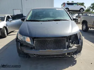 2014 Honda Odyssey LX with VIN 5FNRL5H29EB101385, listed as a Copart auction lot 53571095 with 137,067 mi miles and Salvage Title. Bid and sale history available at carsss.com. Image 5.