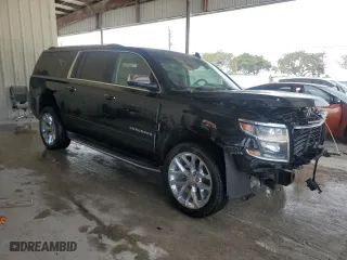 2017 Chevrolet Suburban Premier with VIN 1GNSKJKCXHR122234, listed as a Copart auction lot 45488545 with 80,607 mi miles and Salvage Title. Bid and sale history available at carsss.com. Image 4.
