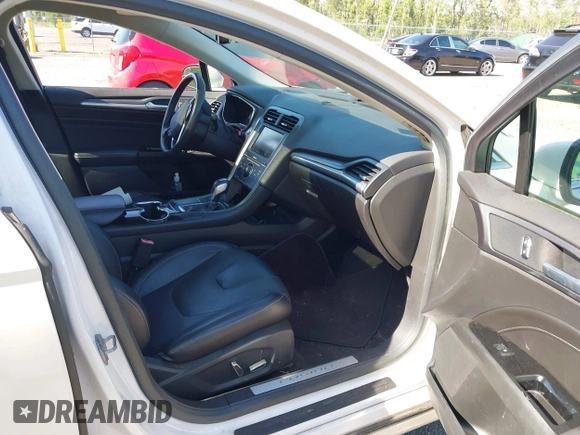 2014 Ford Fusion Titanium Hybrid with VIN 3FA6P0RU3ER279212, listed as a IAAI auction lot 42241465 with 155,841 mi miles and . Bid and sale history available at DreamBid. Image 5.