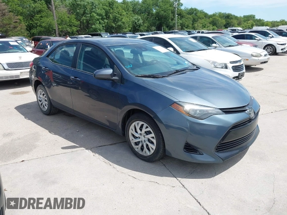 2018 Toyota Corolla L z VIN 5YFBURHE4JP820560, wystawiony jako IAAI lot #42317624 z przebiegiem 84 946 mil mil oraz . Historia ofert i sprzedaży dostępna na DreamBid. Obrazek 1.