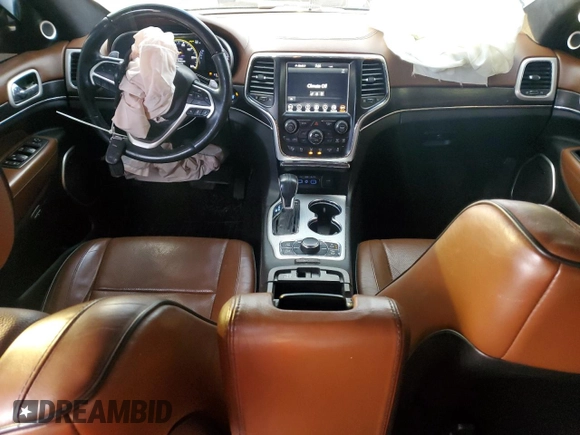 2018 Jeep Grand Cherokee Summit with VIN 1C4RJFJT2JC390079, listed as a Copart auction lot 43502555 with 106,724 mi miles and Salvage title. Bid and sale history available at DreamBid. Image 8.