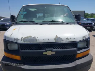 2011 Chevrolet Express Cargo Van with VIN 1GCZGUCGXB1114930, listed as a IAAI auction lot 42015104 with 364,789 mi miles. Bid and sale history available at carsss.com. Image 12.