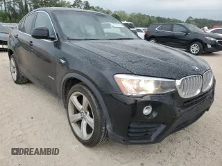 2015 BMW X4 xDrive28i with VIN 5UXXW3C53F0M87742, listed as a Copart auction lot 47161944 with 150,200 mi miles. Bid and sale history available at carsss.com. Image 4.