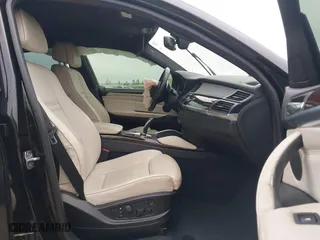 2014 BMW X6 50i with VIN 5UXFG8C51EL592556, listed as a IAAI auction lot 41604940 with 88,310 mi miles. Bid and sale history available at carsss.com. Image 5.