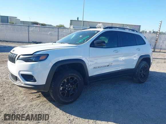 2022 Jeep Cherokee X with VIN 1C4PJMCX2ND533284, listed as a IAAI auction lot 41827335 with 19,404 mi miles. Bid and sale history available at carsss.com. Image 2.